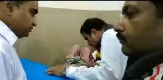 Here is another video of the CM inside the hospital, speaking to patients and the mother and child can clearly be seen behind him.